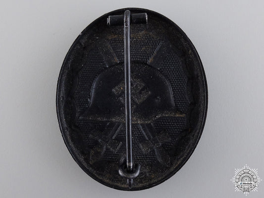 a_second_war_black_grade_wound_badge_img_02.jpg5478f04a5e704