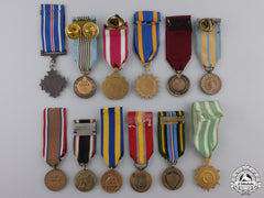 Twelve Miniature American Service And Campaign Medals