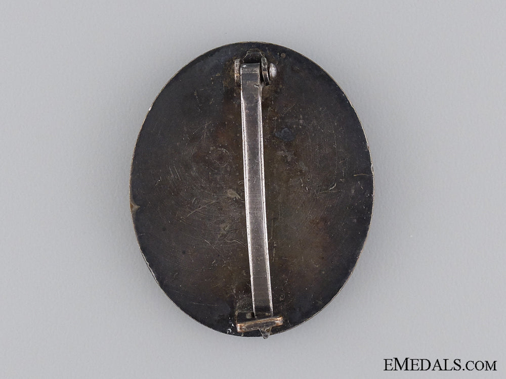 a_silver_grade_wound_badge;_marked"30"_img_02.jpg53e3c9707d35b