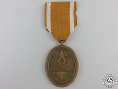 A West Wall Medal With Packet Of Issue