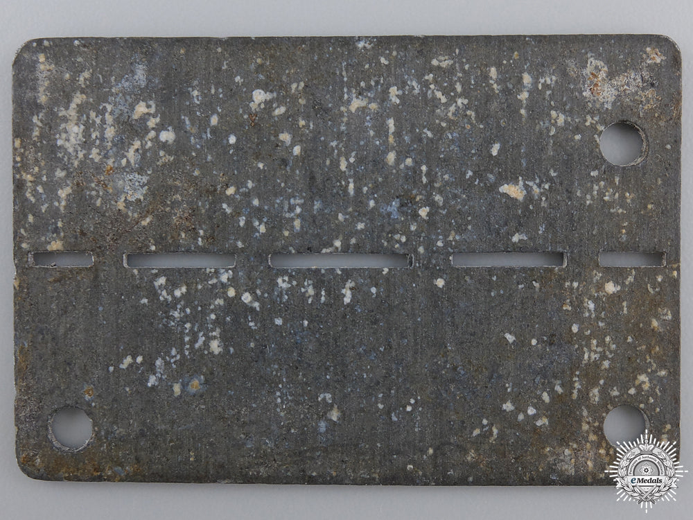 a_second_war_allied_pow_id_tag;_stalag_viii_b_img_02.jpg54d238fa4a064