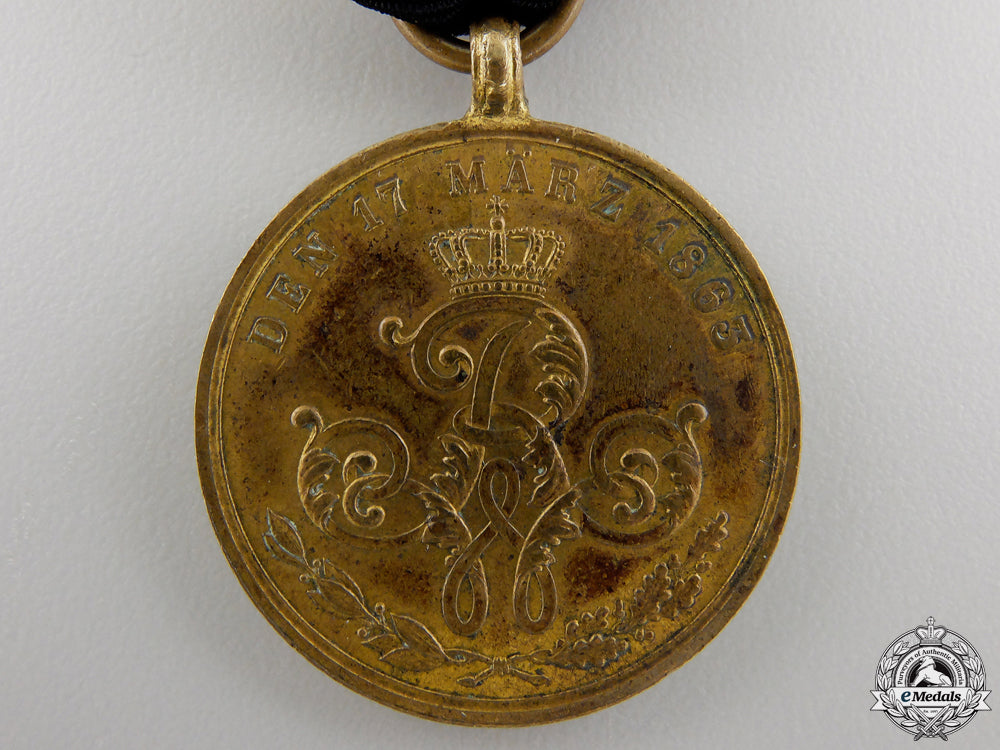 an1863_prussian_commemorative_war_merit_medal_img_02.jpg5565c2d9b52d8