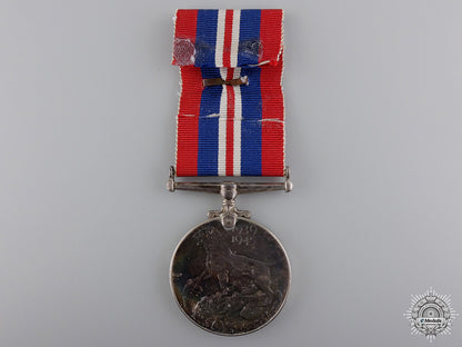 a_second_war_canadian_issue_war_medal_with_mid_img_02.jpg54c3e895c21c6