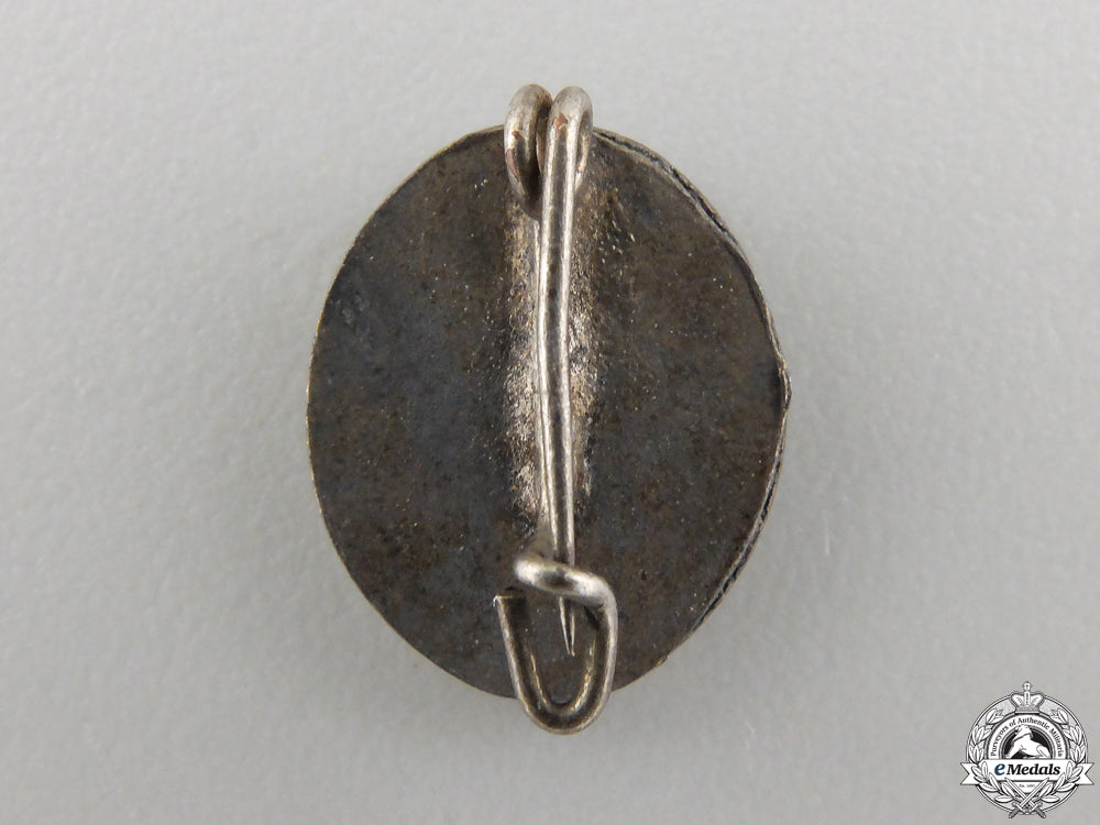 a_miniature_silver_grade_wound_badge_img_02.jpg557861ac32ec9