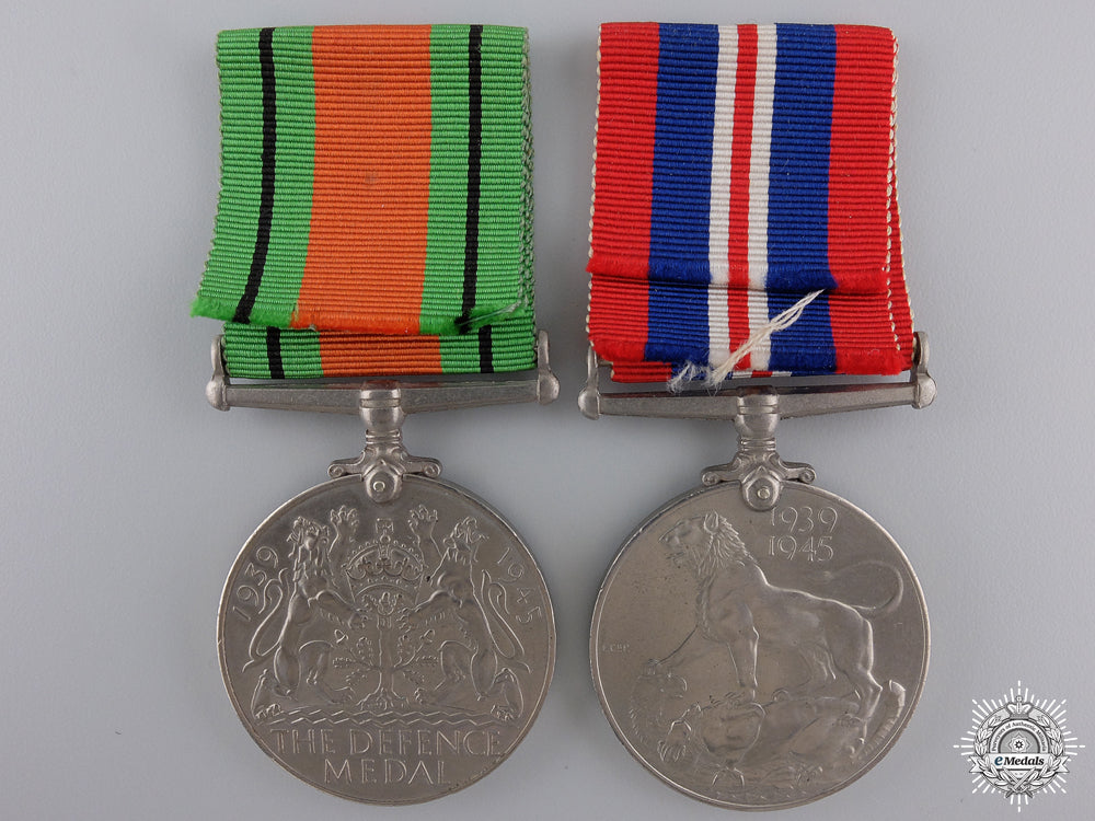 two_second_war_british_issue_service_medals_with_container_img_03.jpg54e768b2b6992