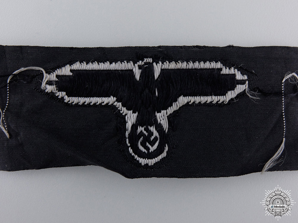 a_mint_section_of_waffen-_ss_field_cap_insignia_img_03.jpg54f875ef864b3