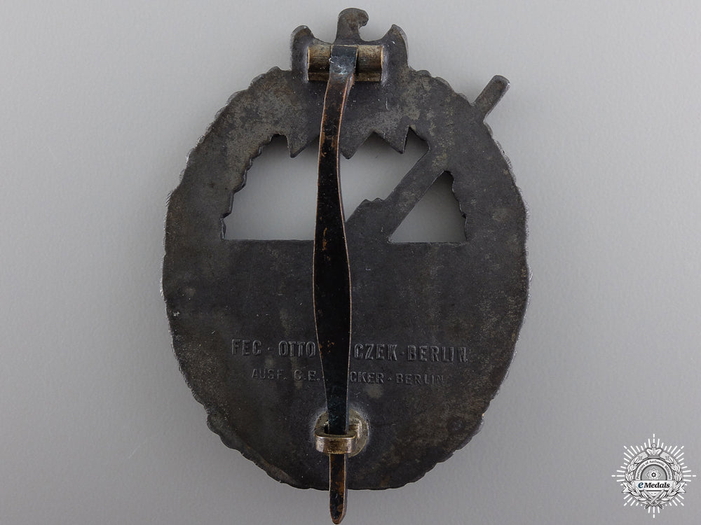a_kriegsmarine_coastal_artillery_badge_with_recipient_photographs_img_03.jpg54c279e22ca77