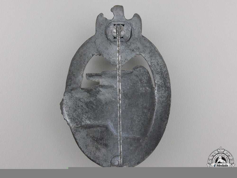 a_silver_grade_tank_assault_badge_by_rudolf_karneth&_söhne,_gablonz_img_03.jpg55520eeebd6b3