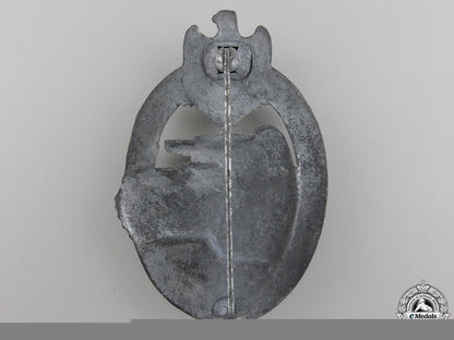 a_silver_grade_tank_assault_badge_by_rudolf_karneth&_söhne,_gablonz_img_03.jpg55520eeebd6b3