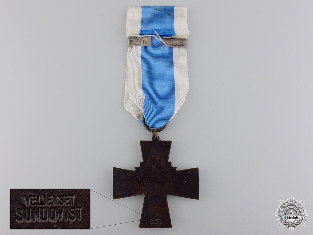 a_finnish_blue_cross_for_the_civil_guard_img_03.jpg54737e9db3f8a