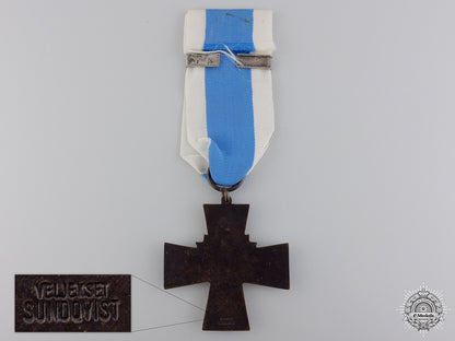 a_finnish_blue_cross_for_the_civil_guard_img_03.jpg54737e9db3f8a