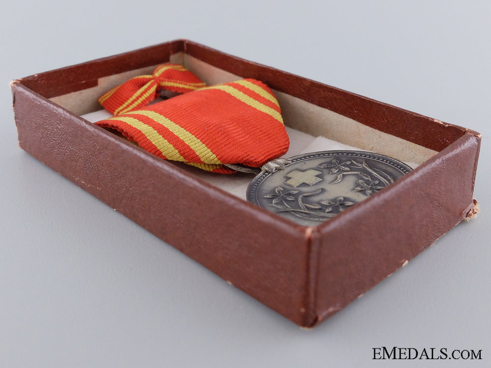 a_manchukuo_red_cross_medal_img_03.jpg53aaf18d11d4d
