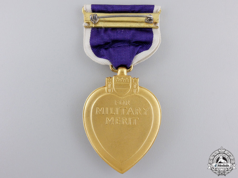 a_puprle_heart_to_pte._cox;_normandy_veteran_wounded_in_belgium_img_03.jpg559d4286cf621