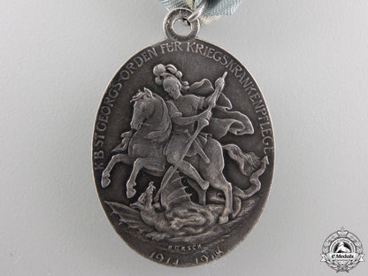 a1914-18_bavarian_merit_medal_of_st._george’s_order_img_03.jpg5564d4f8404b2