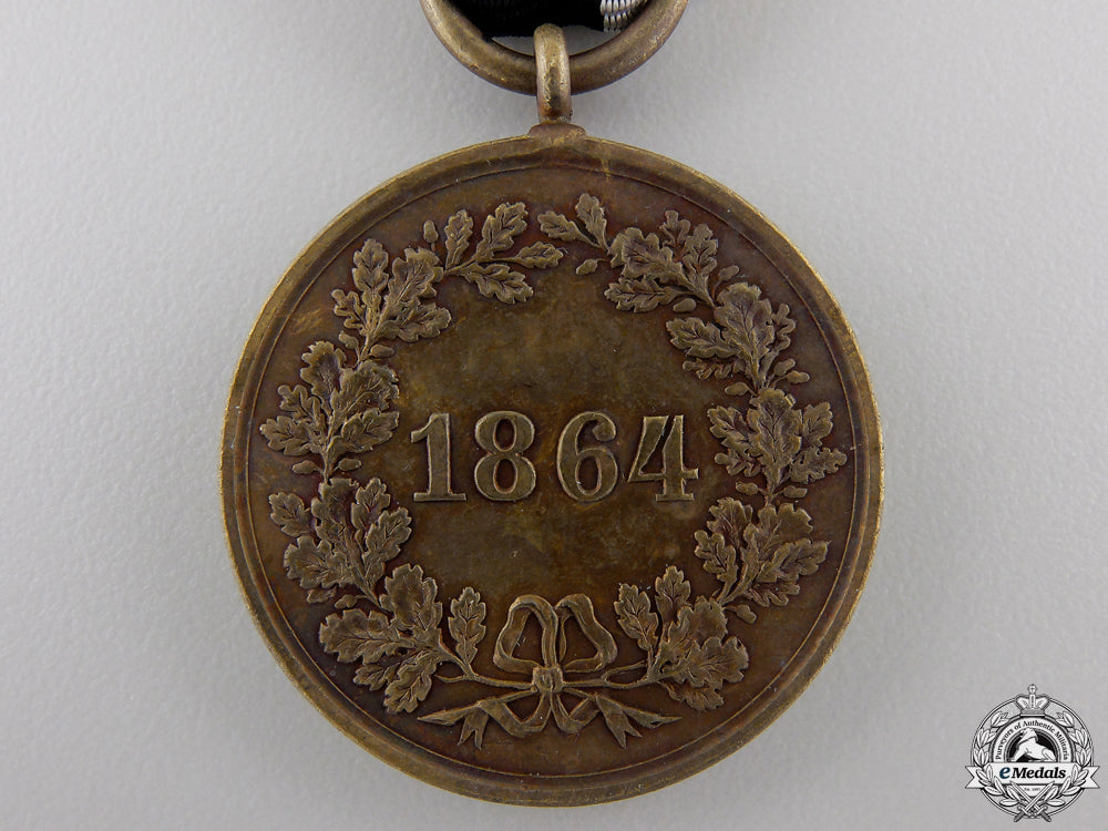an1866_prussian_campaign_medal_for_the_denmark_war_img_03.jpg555603e16b58f