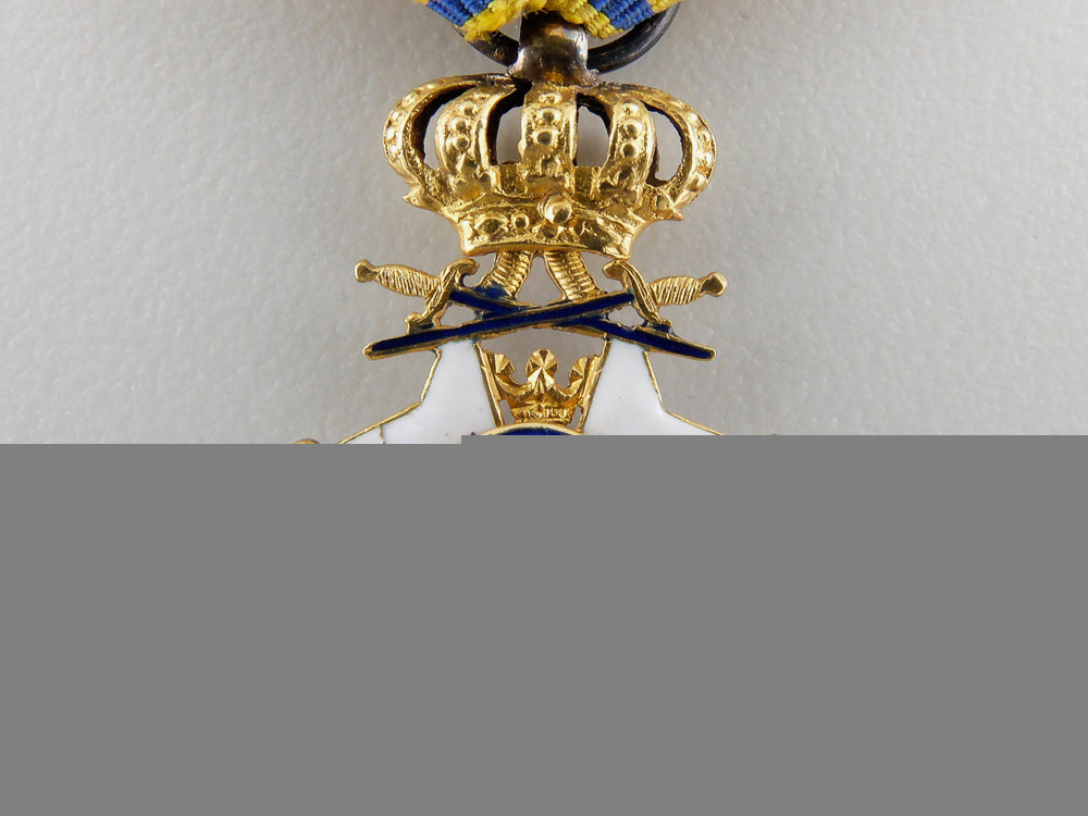 a_miniature_swedish_order_of_the_sword_in_gold_img_03.jpg558413cf1cdcb