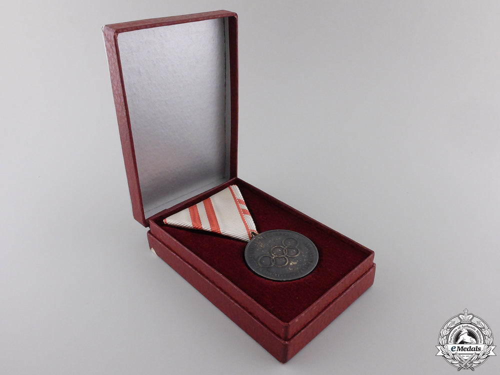 a1964_innsbruck_olympic_games_medal_with_case_img_03.jpg554a1b46570ed