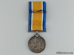 A British War Medal & Badge To The Canadian Tank Corps