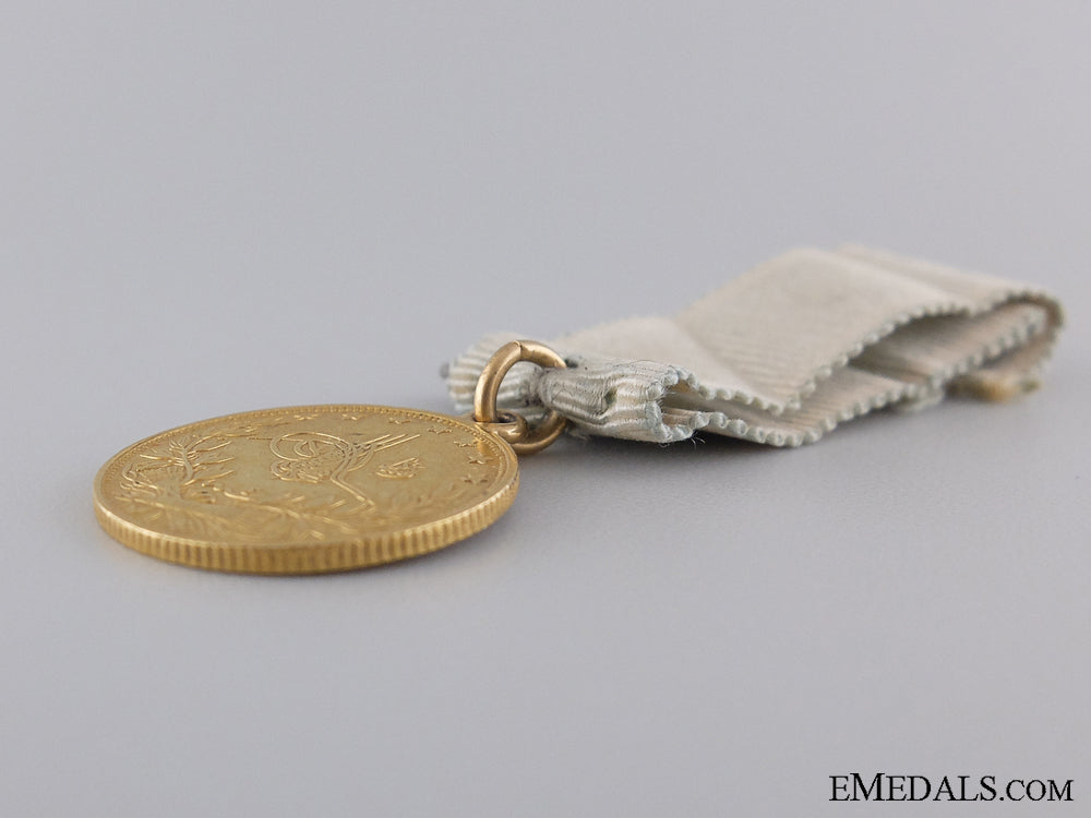 an1862_turkish_medal_of_sishaneli_tufek_in_gold_img_03.jpg53f769ef561d5