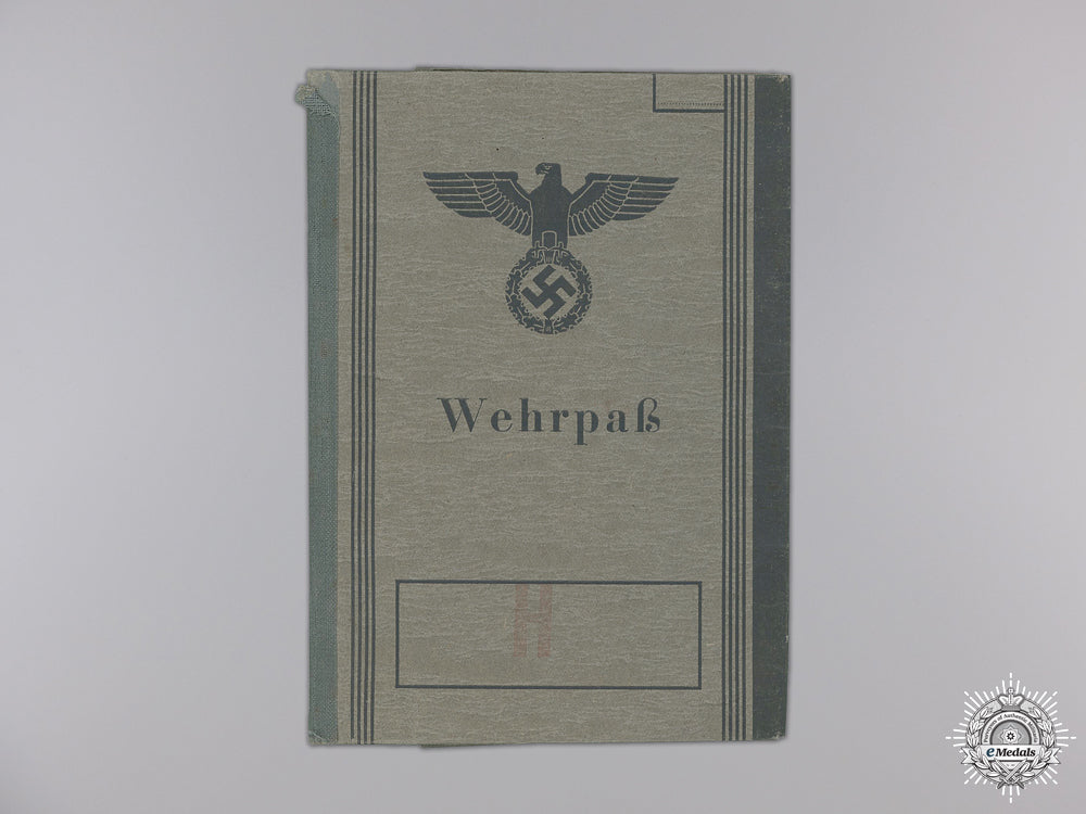 germany,_heer._a_collection_of_documents,_including_german_cross_in_silver_award_document,_to_major_alfred_dorrong_img_03.jpg55300e8b61586_1_1_1_1