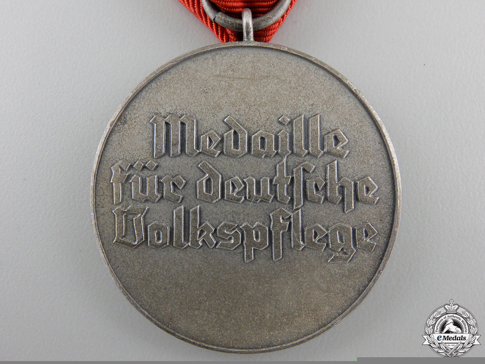 a_social_welfare_medal_with_packet_of_issue_img_04.jpg55ae6262eb5e5