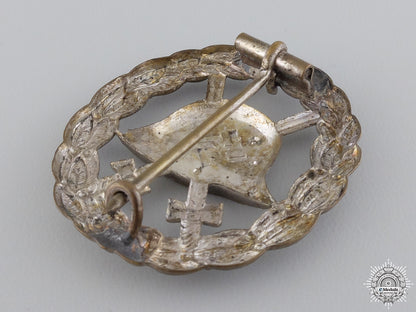 a_rare_silver_grade_wound_badge:_cut_out_version_img_04.jpg54733ae17ddd2