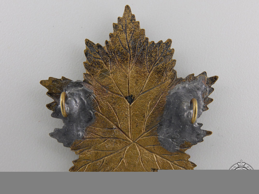 a_first_war2_nd_battalion"_eastern_ontario_regiment"_cap_badge_img_04.jpg555f3c7b96a9a