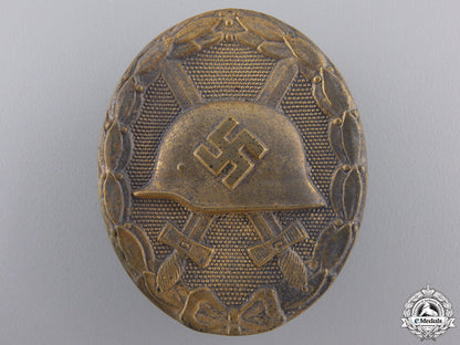 a_gold_grade_wound_badge_with_case_img_04.jpg55229349a71aa
