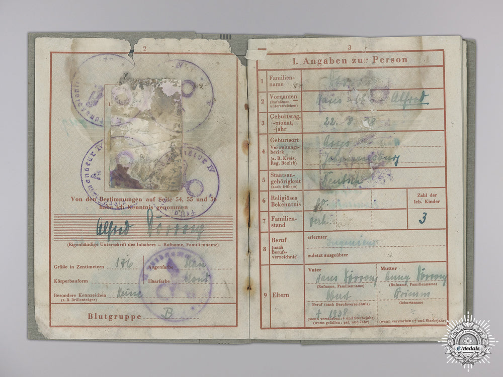 germany,_heer._a_collection_of_documents,_including_german_cross_in_silver_award_document,_to_major_alfred_dorrong_img_04.jpg55300e922dcef_1_1_1_1