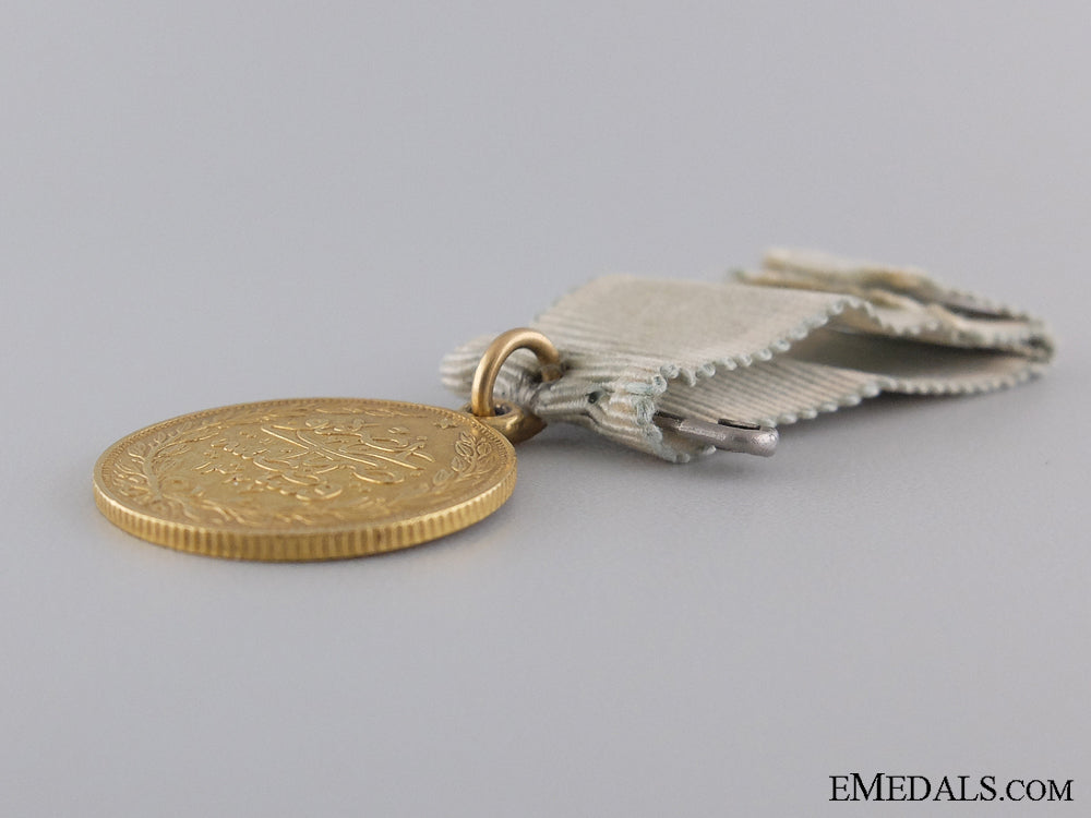 an1862_turkish_medal_of_sishaneli_tufek_in_gold_img_04.jpg53f769f66345b