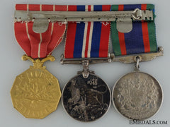 A Canadian Forces Decoration Medal Bar To C.e. Ross Rcaf