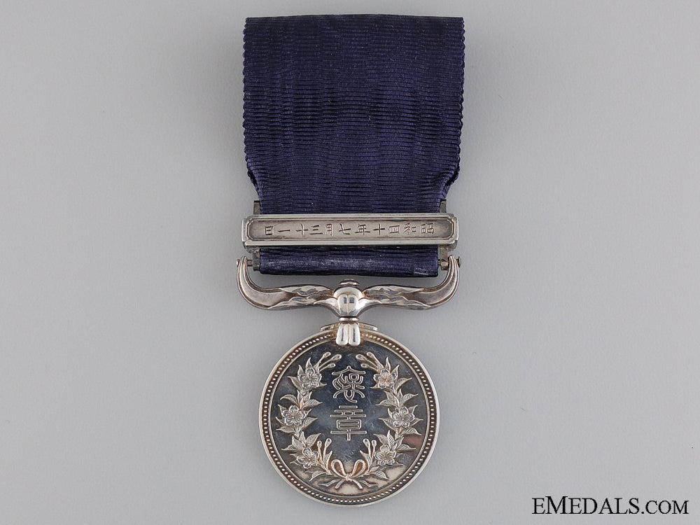 japan,_empire._a_merit_medal,_named_with_case_img_04.jpg541c45e7be1ea