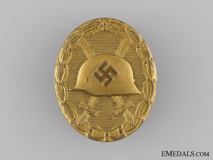 an_early_gold_grade_wound_badge_with_case_of_issue_img_04.jpg53e37bba78e95