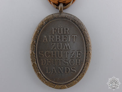 a_second_war_west_wall_medal_with_packet_img_04.jpg54eca7111d706