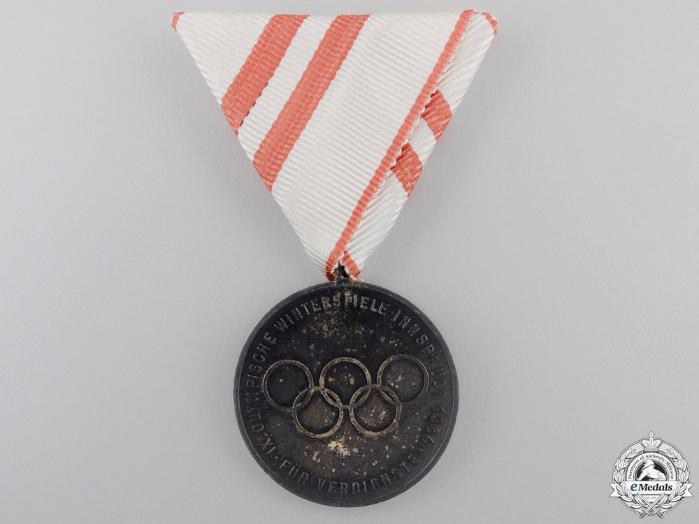 a1964_innsbruck_olympic_games_medal_with_case_img_04.jpg554a1b5439733