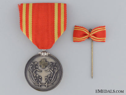 a_manchukuo_red_cross_medal_img_04.jpg53aaf197c0b8f