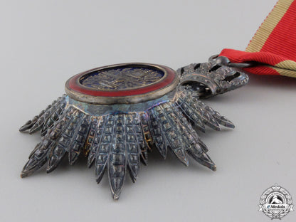 cambodia._an_order_of_cambodia;_knight's_badge_img_04.jpg5540d9e66e649