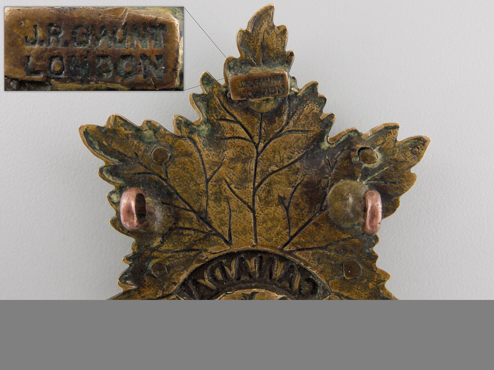 a_scarce_first_war_eaton's_motor_machine_gun_battery_cap_badge_img_04.jpg555ba4bb00ed1