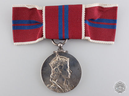 a_ladies1953_qeii_coronation_medal_with_case_img_04.jpg5470c78e90e47