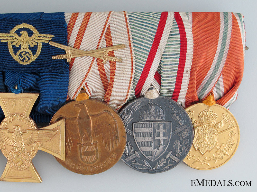 a_seven_piece_german_medal_bar_with_matching_miniatures_img_04.jpg5308e2787c946