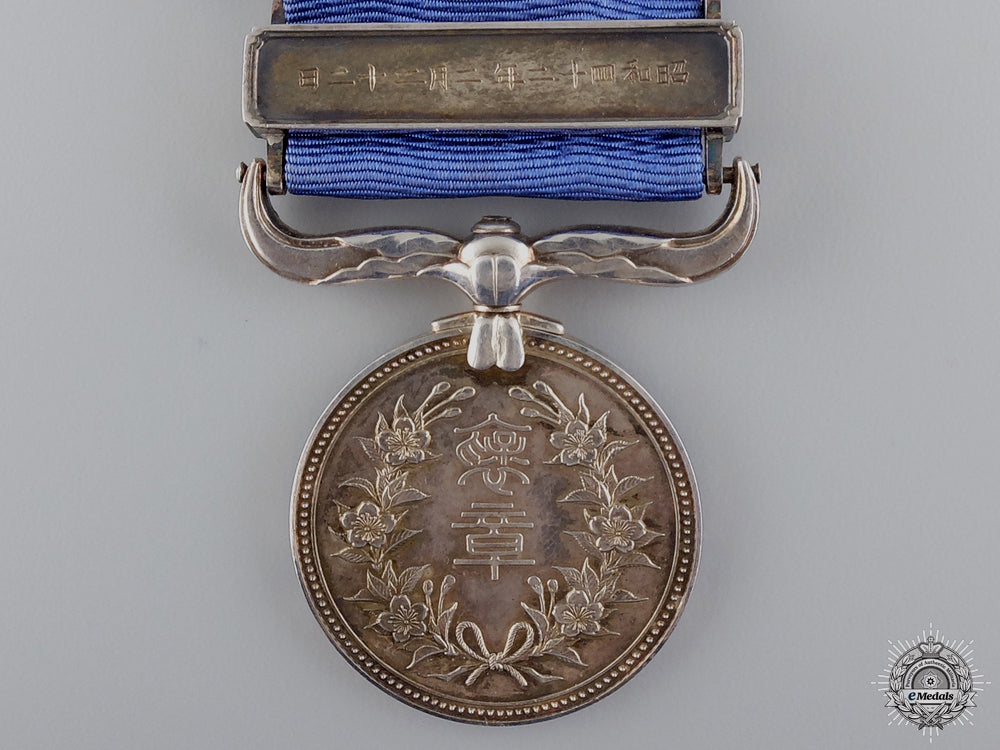 a_japanese_civic_merit_medal_with_case;_named_img_05.jpg54c3c34316725