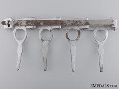 A Japanese Four Medal Suspension Bar With Carton