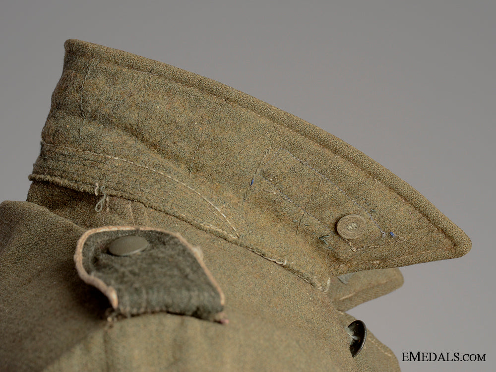 battle_worn_field_blouse&_side_cap,1944_img_05.jpg52e0272f6bb81
