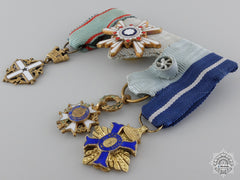 A Japanese Order Of The Sacred Treasure Miniature Group