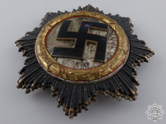 A German Cross In Gold By Juncker