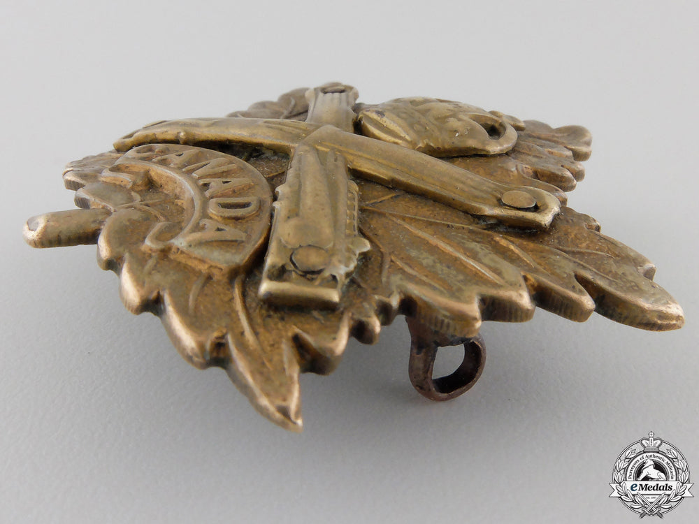 a_scarce_first_war_eaton's_motor_machine_gun_battery_cap_badge_img_05.jpg555ba4c5bb1b9