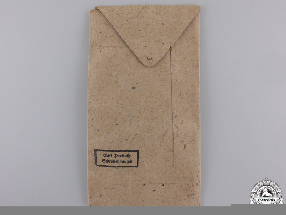 a_west_wall_medal_with_packet_of_issue_img_05.jpg55b644441f206