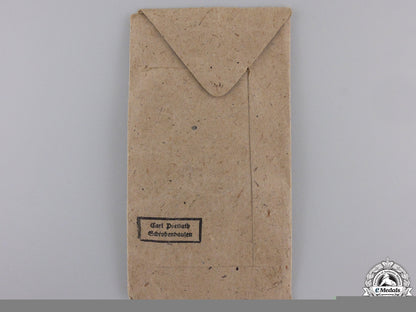 a_west_wall_medal_with_packet_of_issue_img_05.jpg55b644441f206
