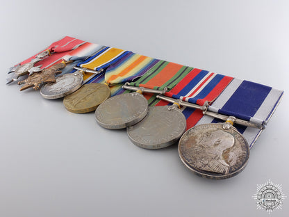 an_mbe&_long_service_medal_bar_to_lieutenant_arthur_r._hughes_img_05.jpg547cd9a263d96