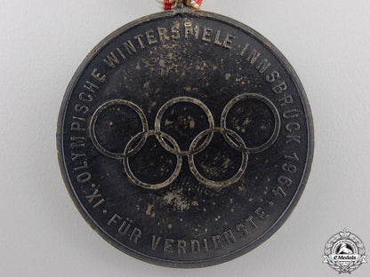 a1964_innsbruck_olympic_games_medal_with_case_img_05.jpg554a1b5c2dfe0